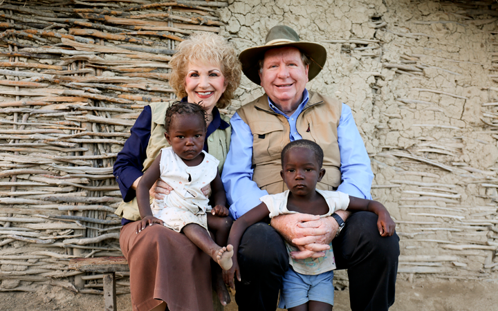 Bobby and Sherry with small Haitian children