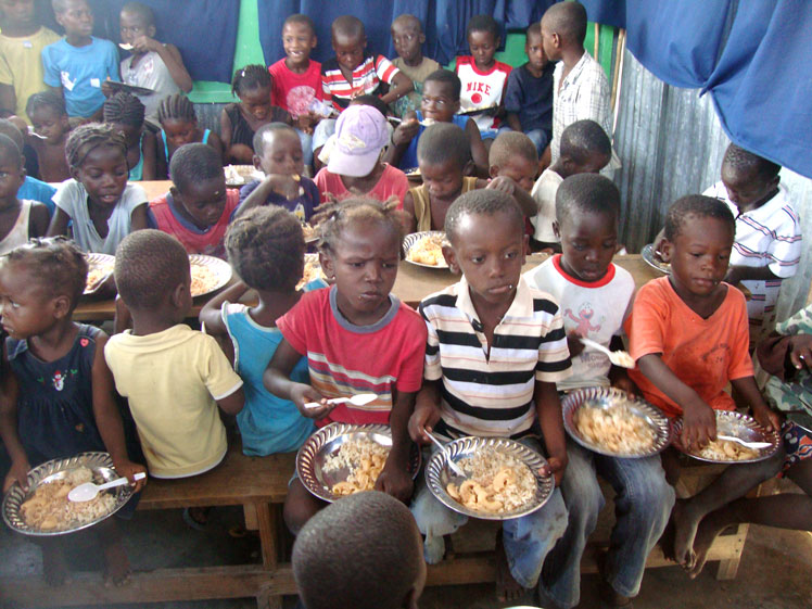 Helping other missionaries feed children: 6-26-2015  5:45 PM