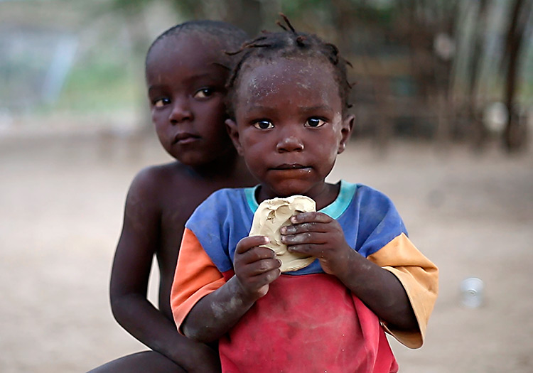 feeding their children mud cookies