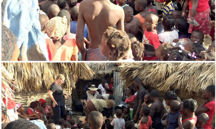 Feeding children in Old Le Tant, Haiti