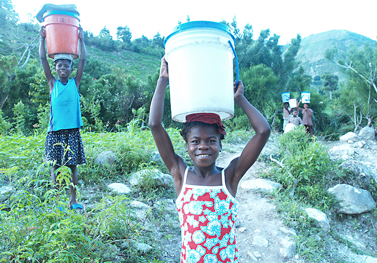 children carrying water buckets