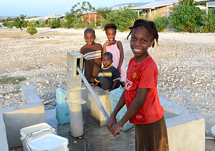 Bringing a clean water supply system into a community.