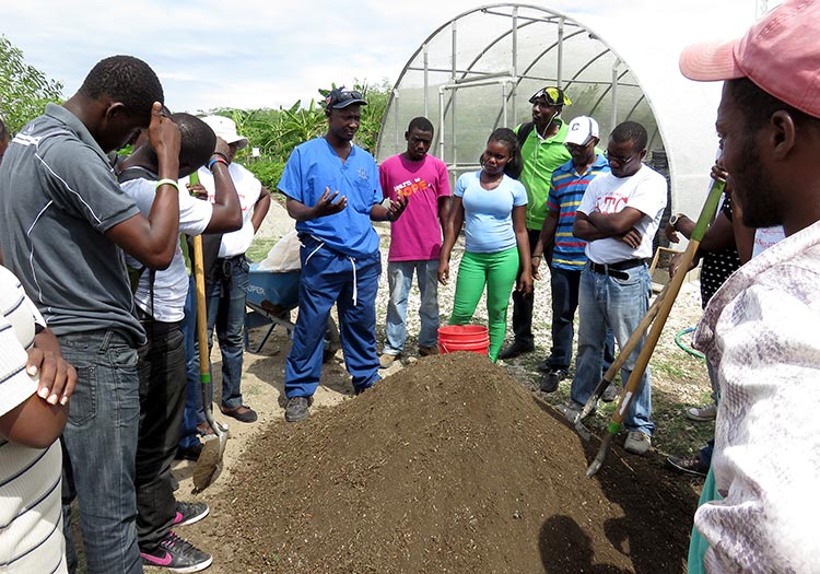 Agricultural Training Center outdoor class about soil.