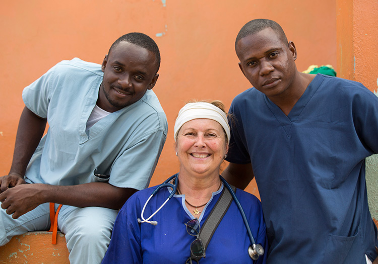 Dr. Glenda O'Brien from Australia and two Haitian doctors, Dr. Edmond, and Dr. Mistral.