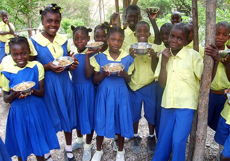 Schoolchildren are given a hot nutritious meal each day.