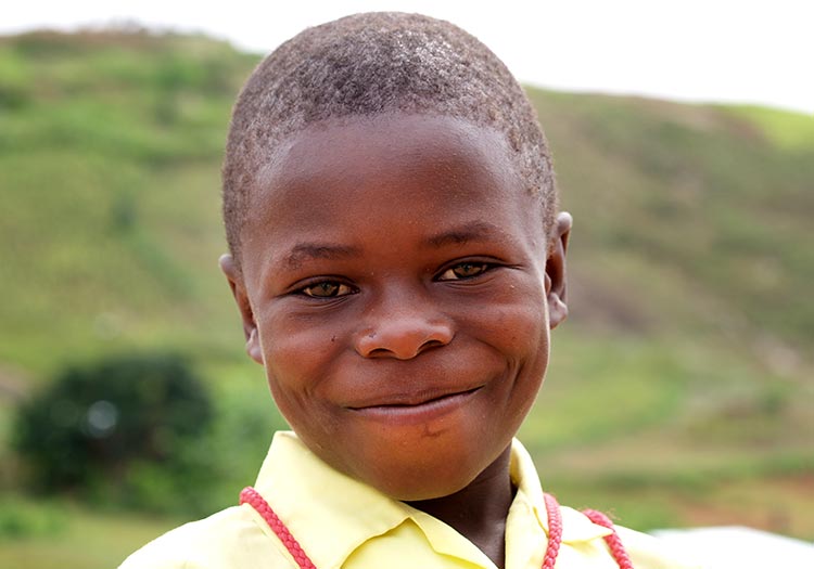 Smiling boy in Peyi Pouri, Haiti - Sponsoring A Child in Haiti.