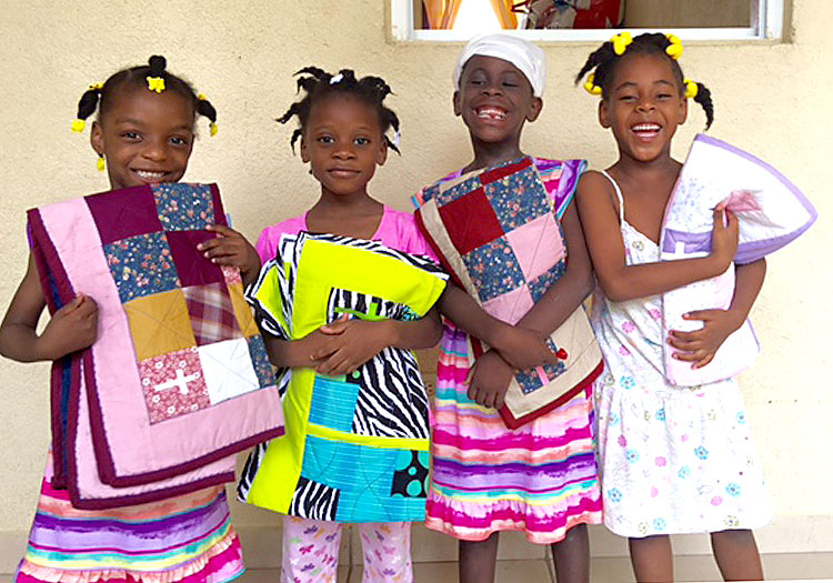Love A Child orphans receive now blankets. - Clothing and blankets.