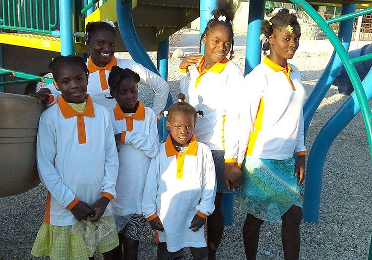 Girls at La Tremble receive new school uniforms
