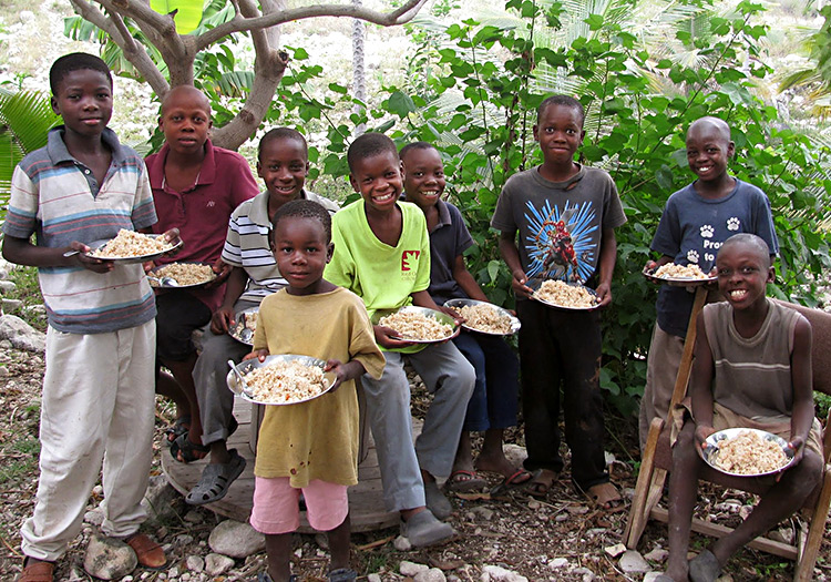 Our Feeding Programs reach out to hundreds of thousands of Haitians