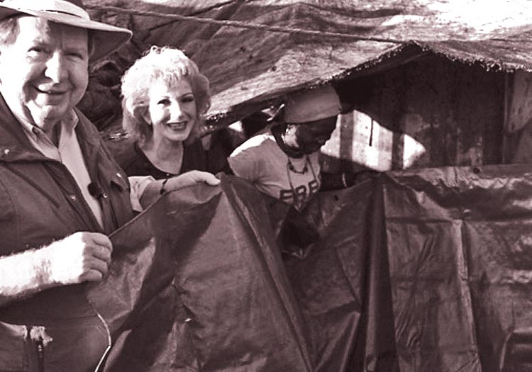 Bobby Sherry distributing tarps at the Truttier Waste Disposal Dump