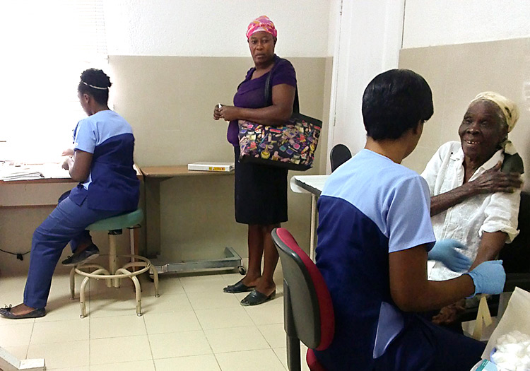 Jesus Healing Center staff with patients