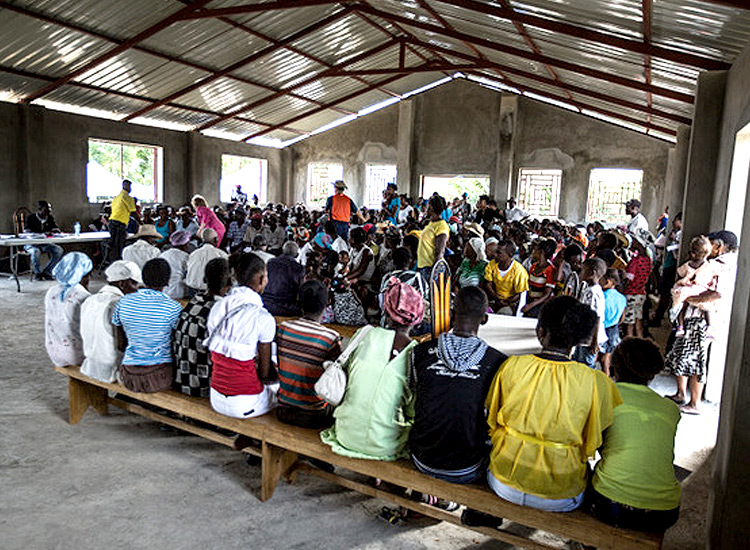 Haitian families waiting in new church to seek medical care