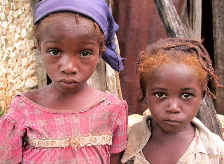 Two starving children in Haiti