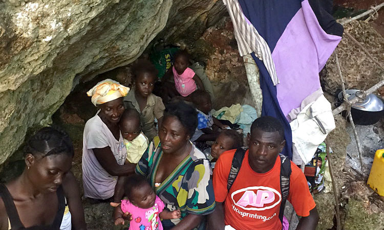 Haitian families living in cave