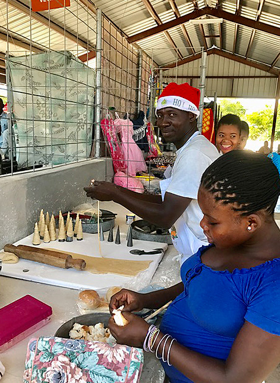 Haitian making Pâte Brisée for the celebration at Gwo Mache Mirak