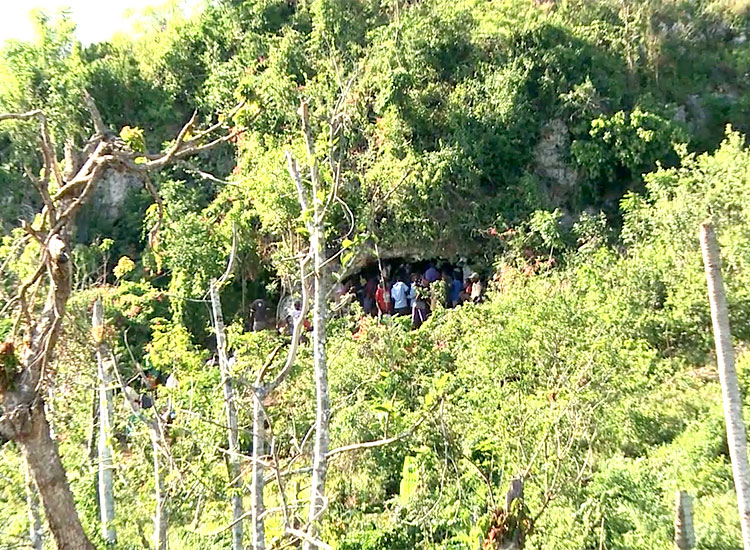 Haitians living in mountain caves after Hurricane Matthew.