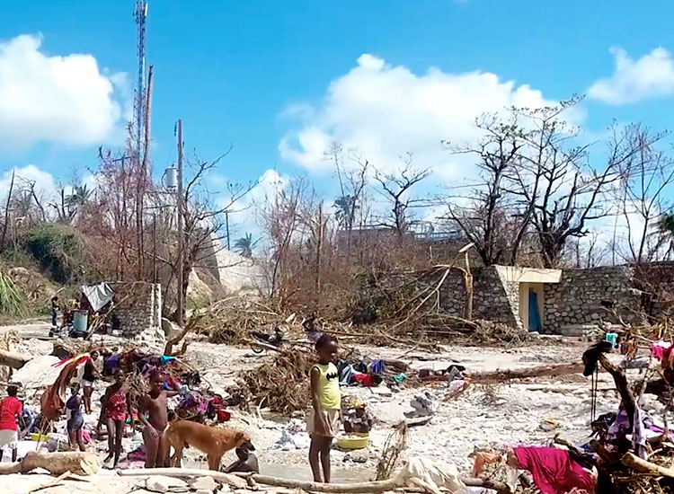 Hungry, sick and wounded poor people in Haiti after hurricane.