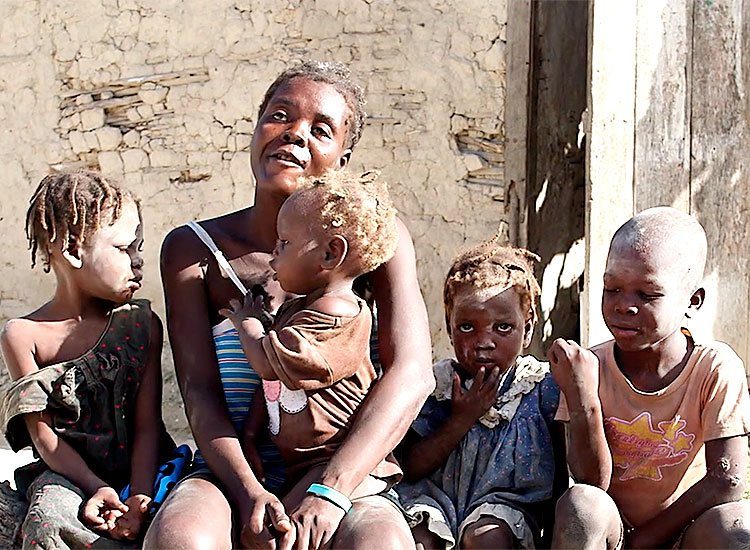 Poor Haitian family, children are starving.