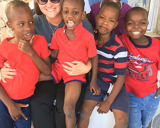 Kaeli with some of the children