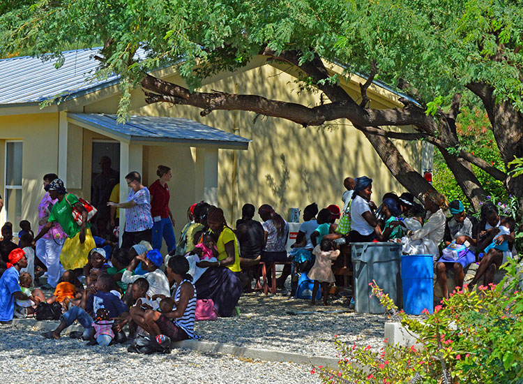 Haitians line up for the Malnutrition Center.