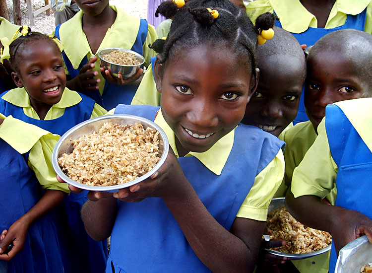 School children receive a hot nutritious meal each day.