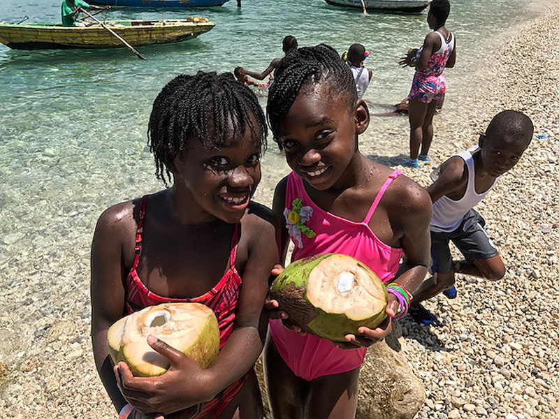 Yolanda and Jolina enjoying coconut