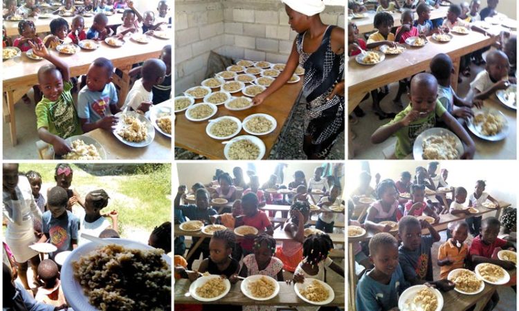 Feeding little children in Haiti