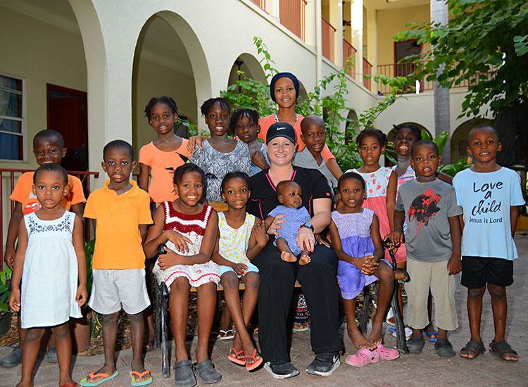 Kaeli, with some of the children at our Love A Child Children's Home.