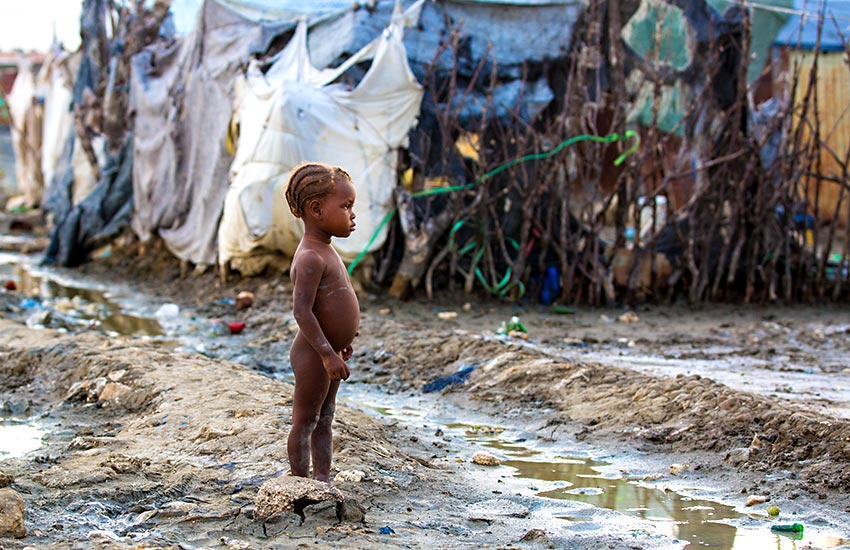 Poor child the area of Rapatrié, Haiti.