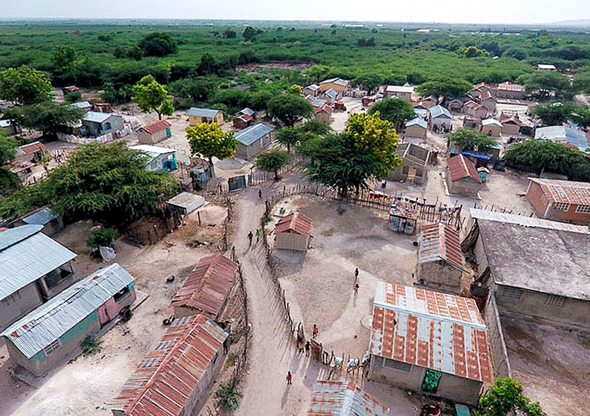 This is Chambrun, a huge Voodoo village filled with people who are dirt poor.