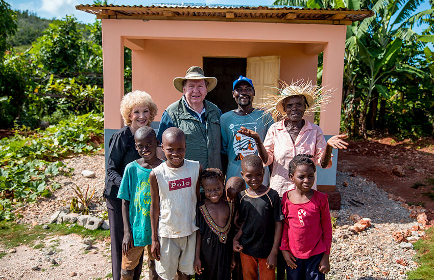 Haitian family move into their new home.