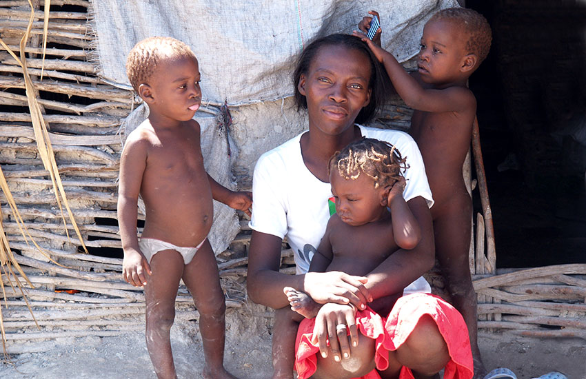 Haitian children with their poor mother.