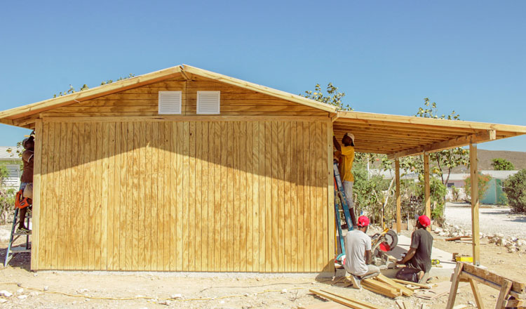 Constructing a new house in Miracle Village.