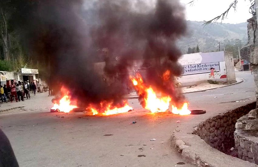 Burning tires in the streets of Haiti.