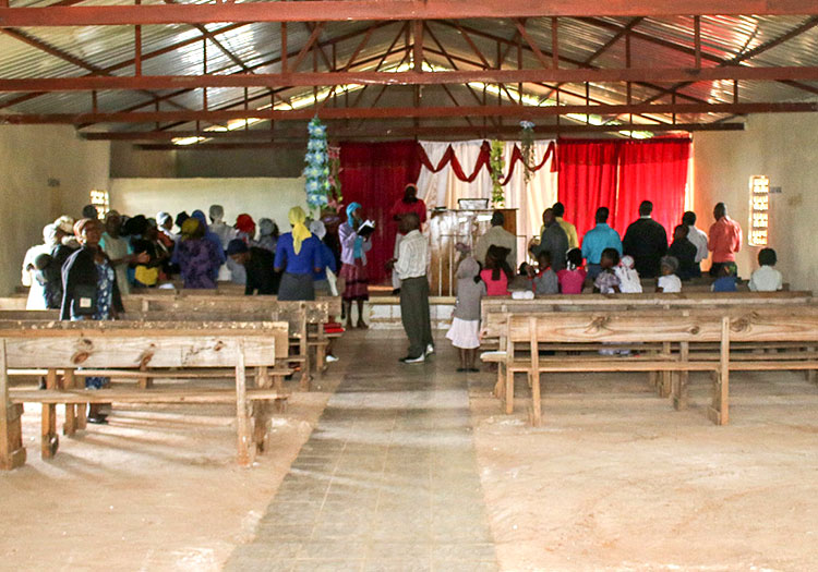 The people and children are so happy with their new church! It’s not finished yet…