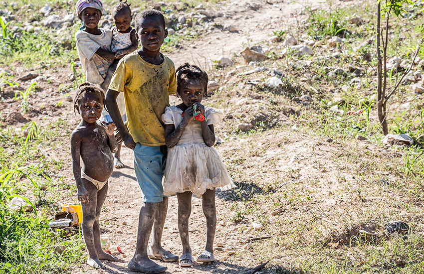 Poor children in the mountains are desperate for food and water.