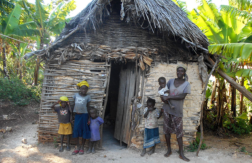 Most Haitian women in our area live in small mud huts they call "KiPi," and their babies are born on the dirt floor.