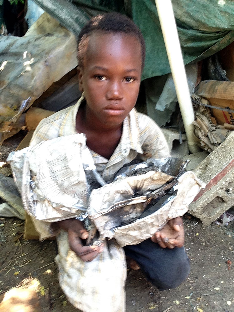 Young Boy Living in the Garbage Dump:  9-16-18   3:40 PM