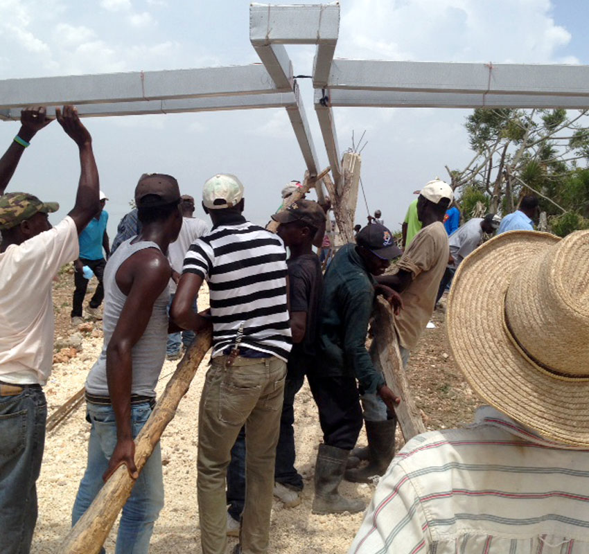 A lighted cross went up in Peyi Pouri. 