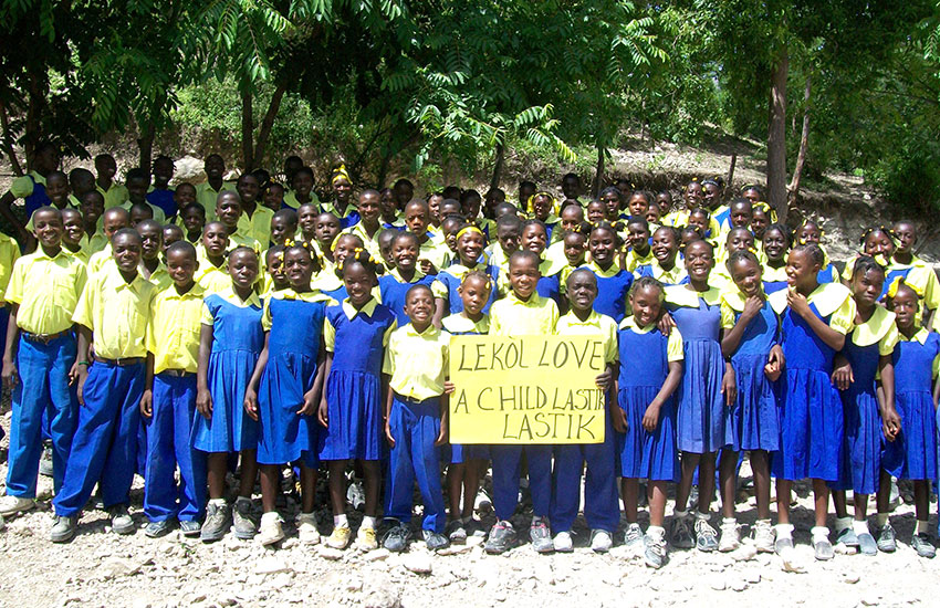 Haitian school children must wear a uniform.