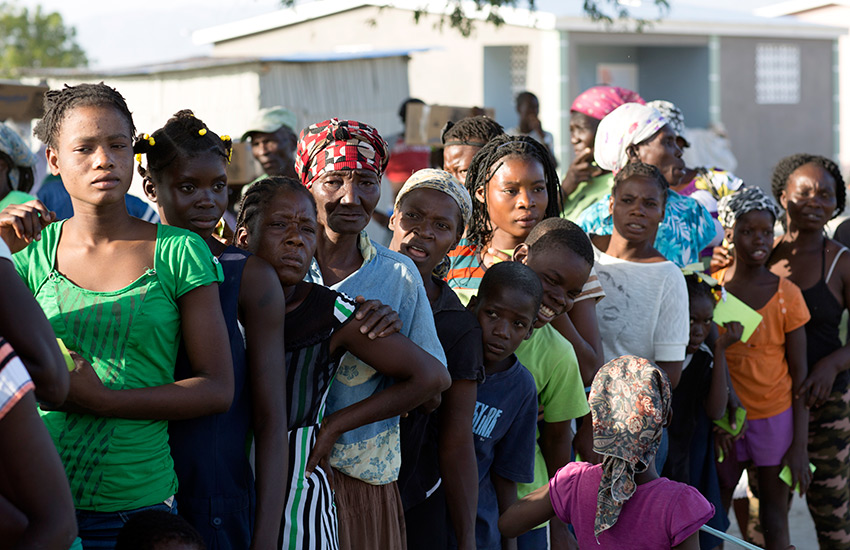 People will stand in crowded long lines when we distribute food.