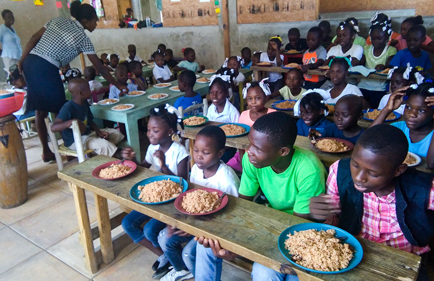 We love “sharing our food” with others, like this orphanage in Haiti.