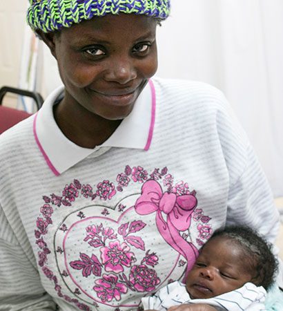 Haitian mother and newborn baby.