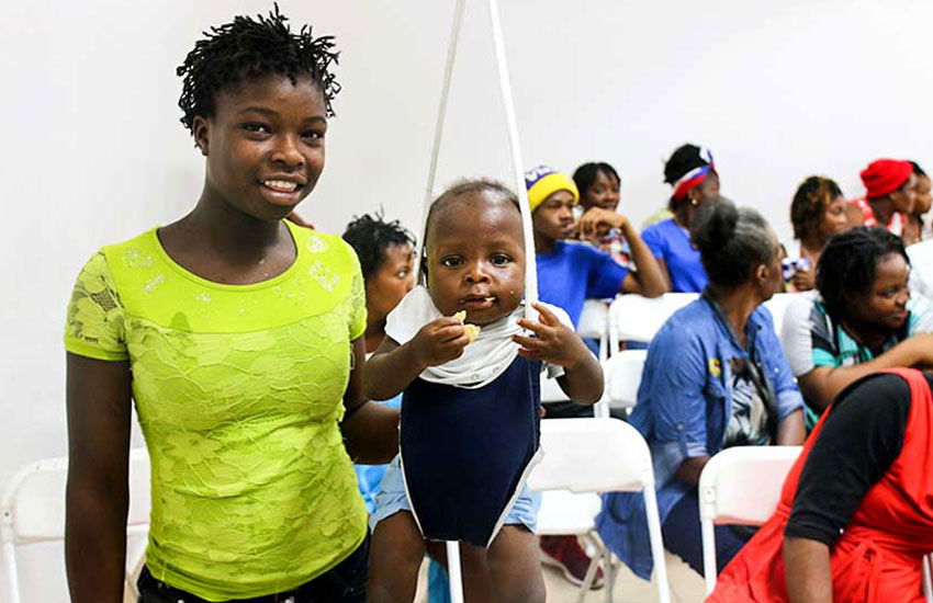 At the Malnutrition Center, babies are weighed, measured and examined. 