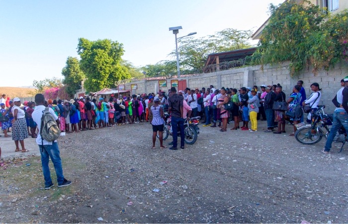 Families waiting to be seen at the Jesus Healing Center.